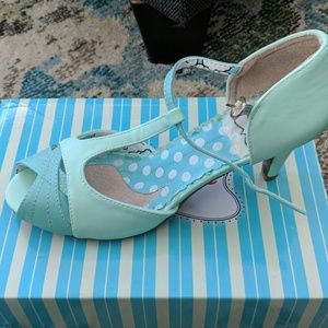 Mint green pumps